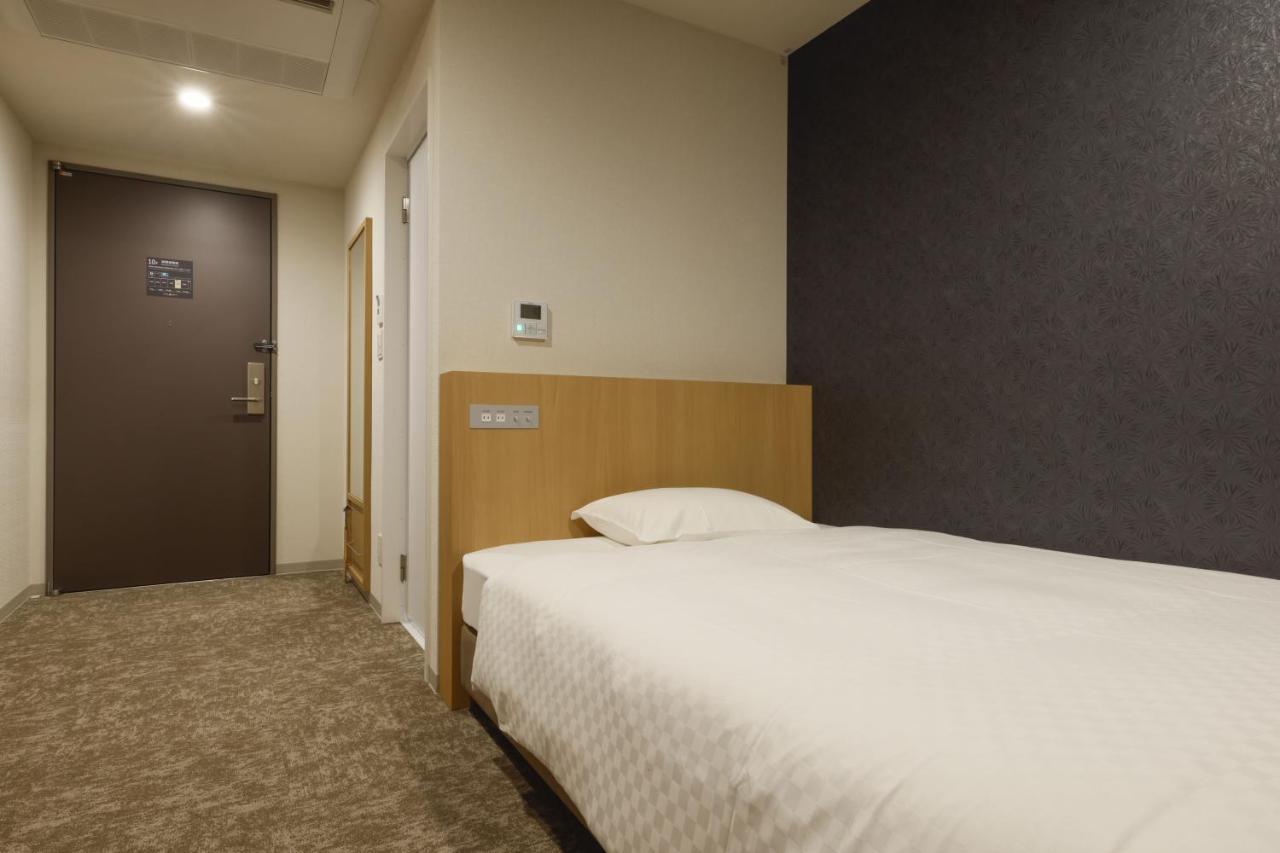 Plum Hotel Осака Экстерьер фото