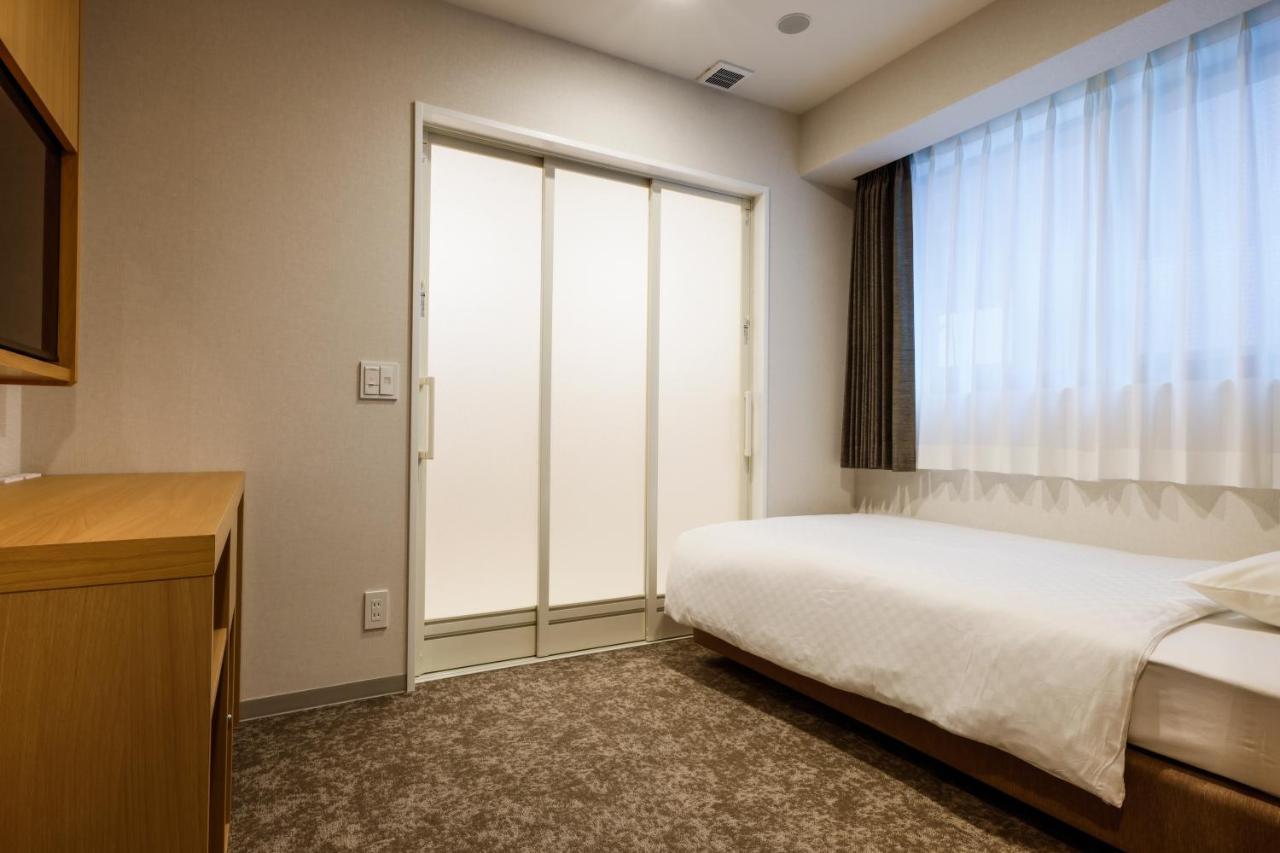 Plum Hotel Осака Экстерьер фото